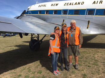 Sharon Kirk, Jane Sharman, Kevin Seaman standing in front of a plane