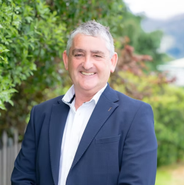 Allister smiling for the camera.