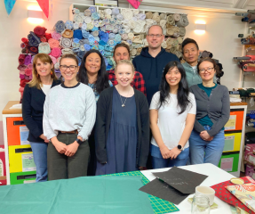 ADInstruments volunteers stood smiling in the Stitch Kitchen.