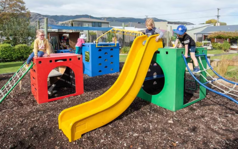 Children playing on a colourful playground.