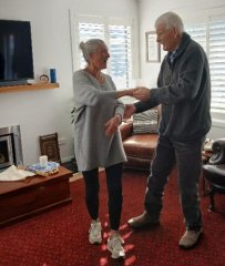 Marion dancing with one of the attendees of the Dementia Mate Wareware HomeShare programme.